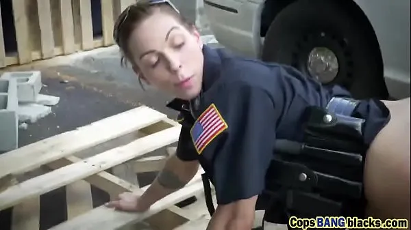 Hete Two female cops fuck a black dude as his punishement verse buis