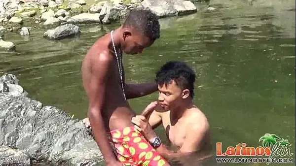Tabung segar Teen gay swimmer playfully going down in the river panas
