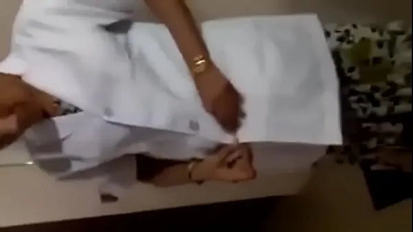 Hete Tamil nurse remove cloths for patients verse buis