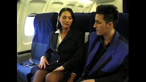 Tabung segar Brunette beauty wearing stewardess uniform gets fucked on a plane panas