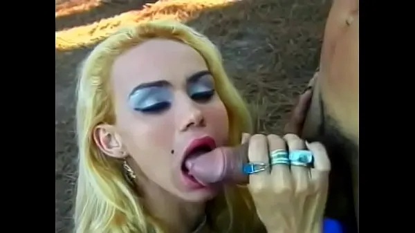 Tabung segar Young blonde transvestite is fucked in the ass under a tree panas