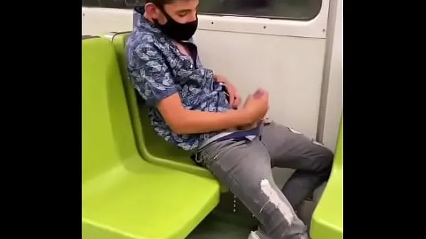 Hete Mask jacking off in the subway verse buis