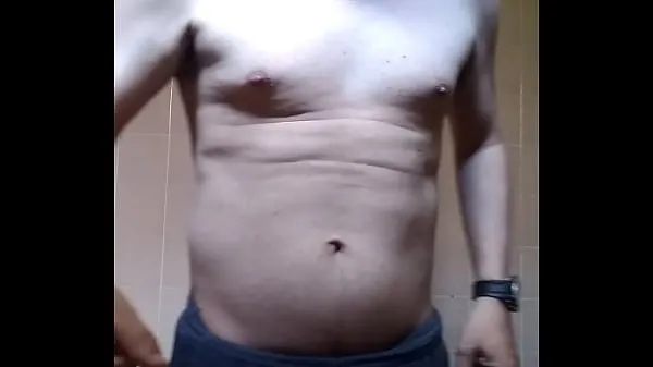 Caliente shirtless man showing off tubo fresco
